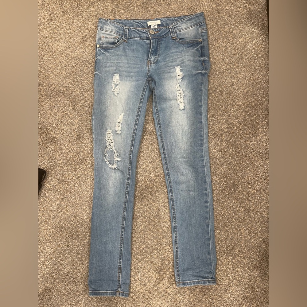 Ripped style blue jeans